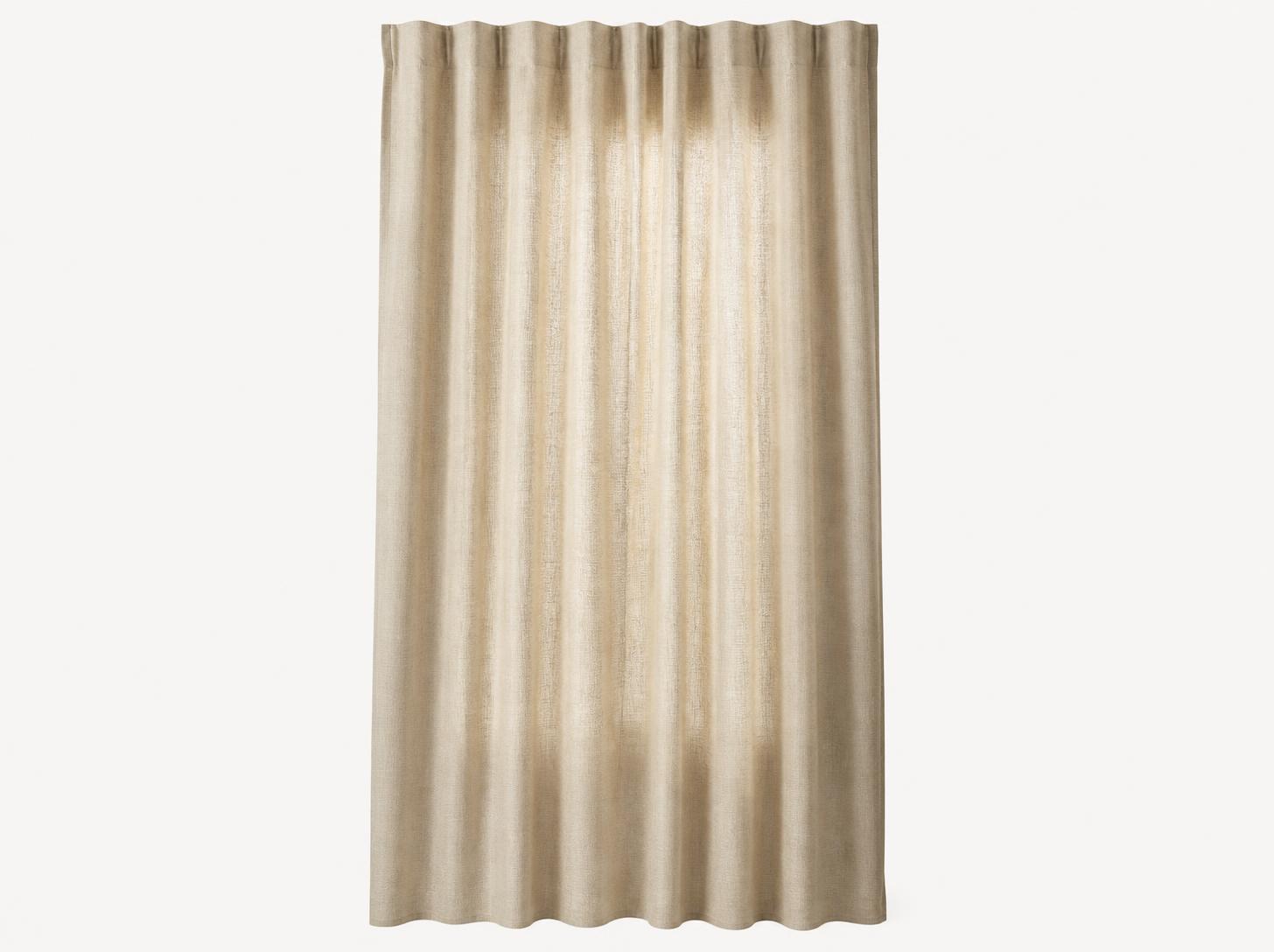 Dimout curtain in natural beige canvas with a wave heading